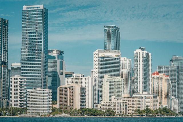 Daytime skyline of Brickell high-rise condo towers in Miami seen across the blue water of Biscayne Bay